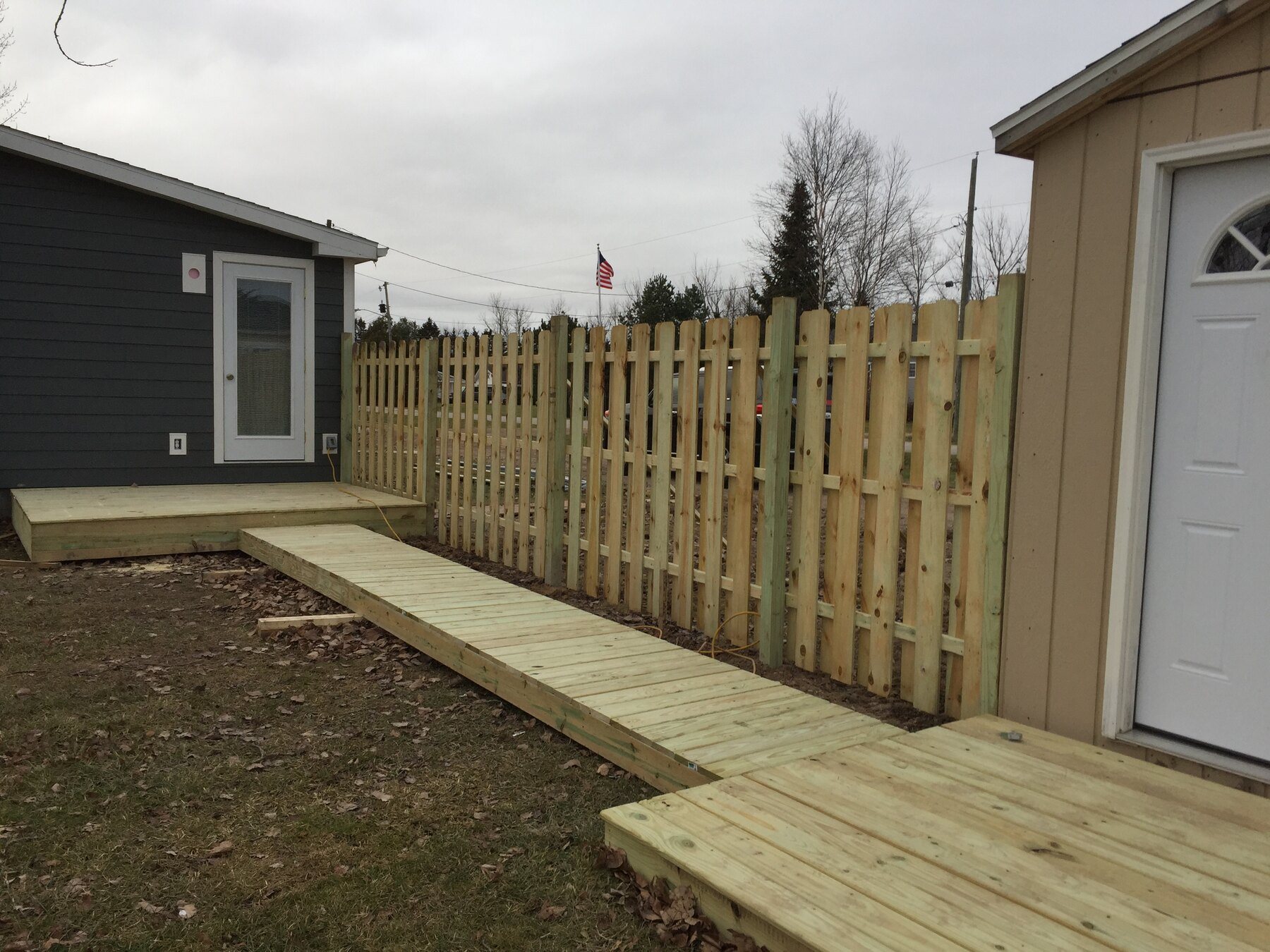 Finished backyard walkway deck and landings