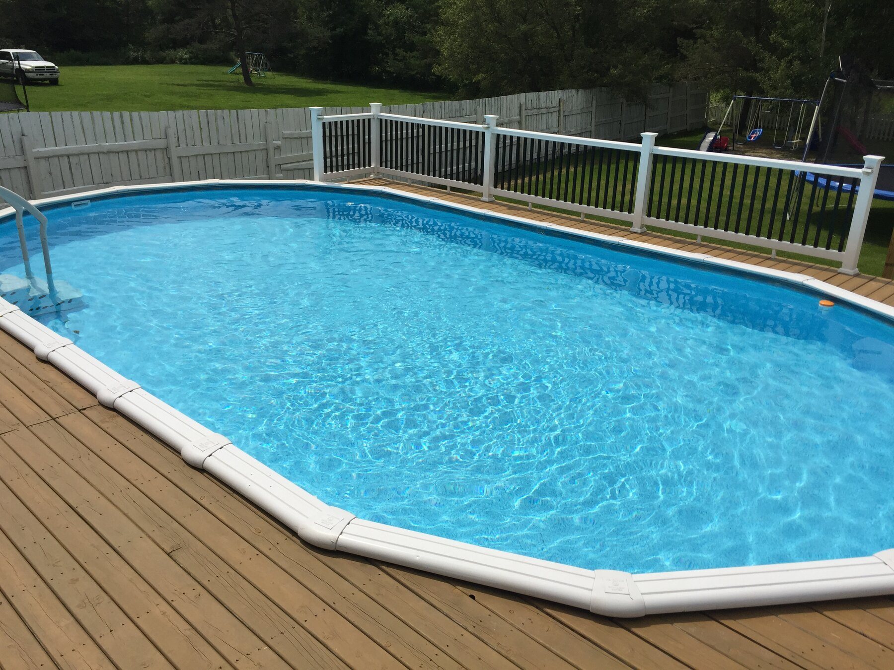 Finished wraparound above-ground pool deck